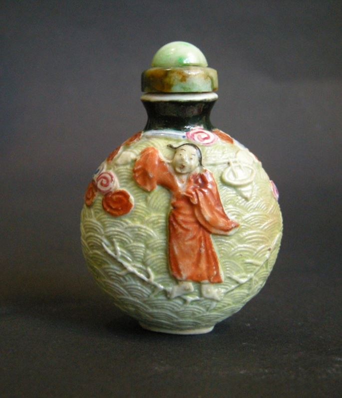 Rare porcelain snuff bottle molded  probably immortal He Xiangu | MasterArt